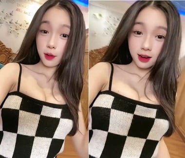 Chịch em xinh đẹp mặc áo caro trong phòng tắm